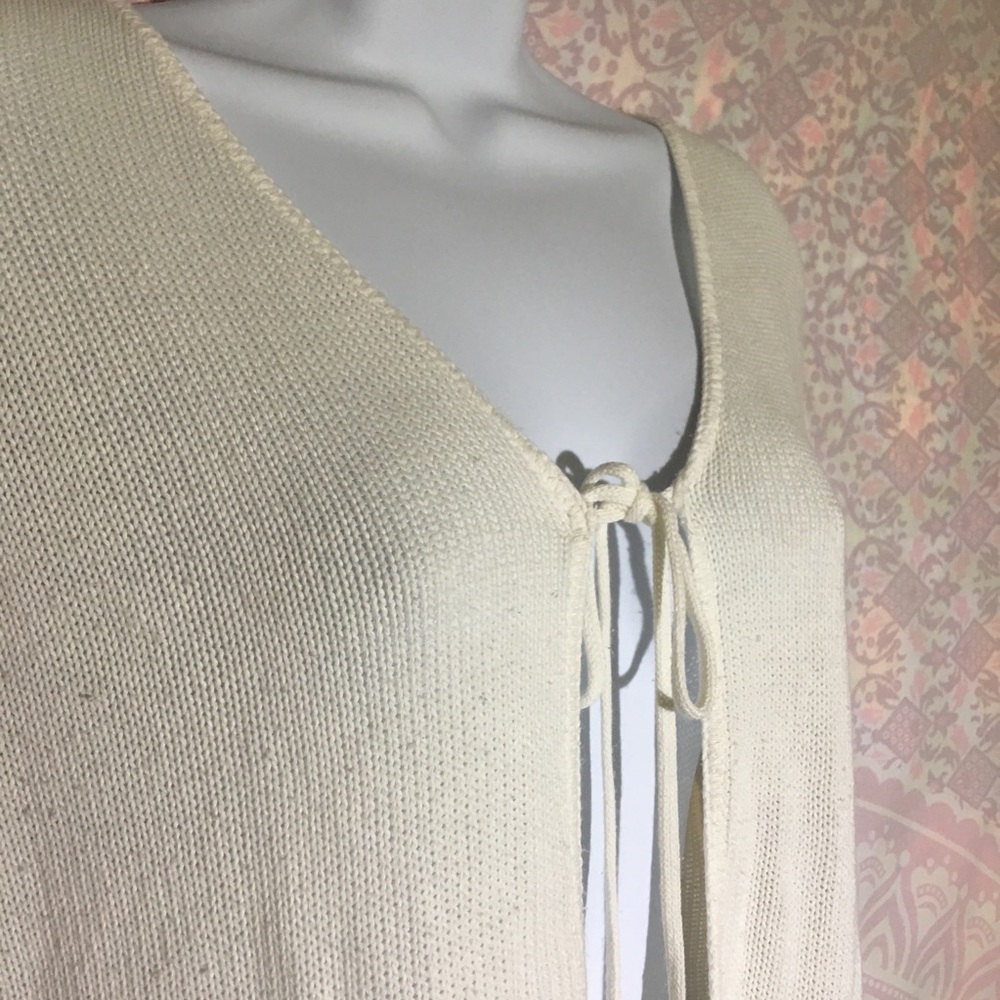 DEFINITELY loose knit, long flare sleeve cardigan